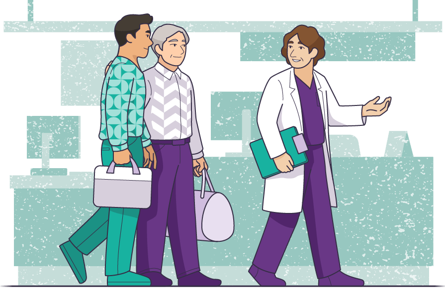 A medical professional walking and guiding a patient and caregiver.