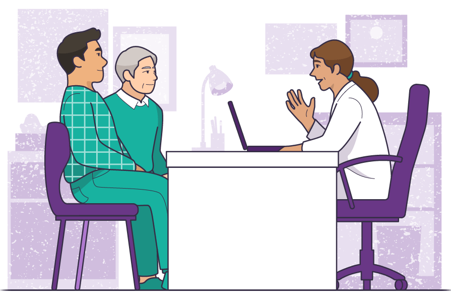 People sitting at a desk assessing treatment options with a medical staff member.